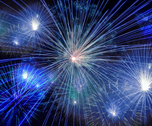 Fireworks exploding in a black sky