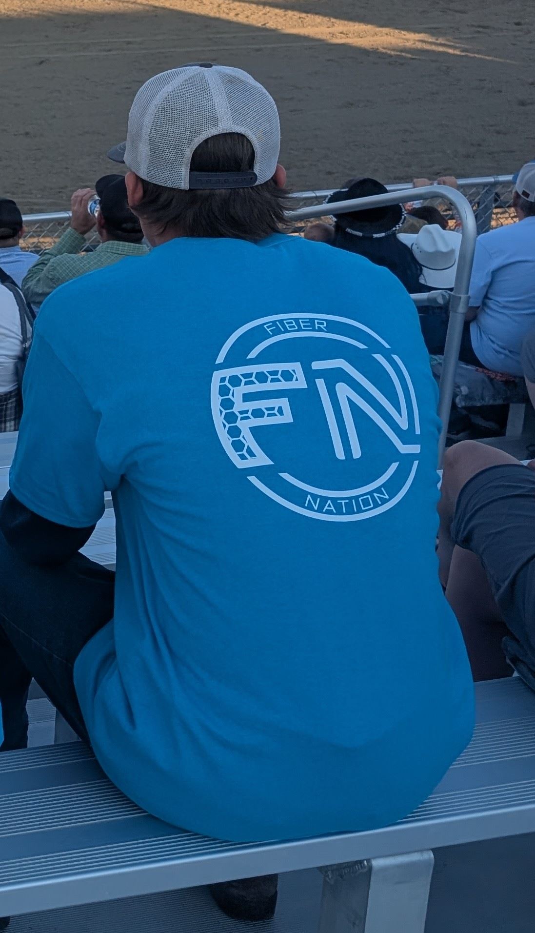 Picture of the back of the youth council tshirt with their sponsor logo on it