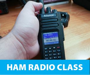 Hand holding a HAM radio