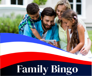 Family looking at a card sitting outside